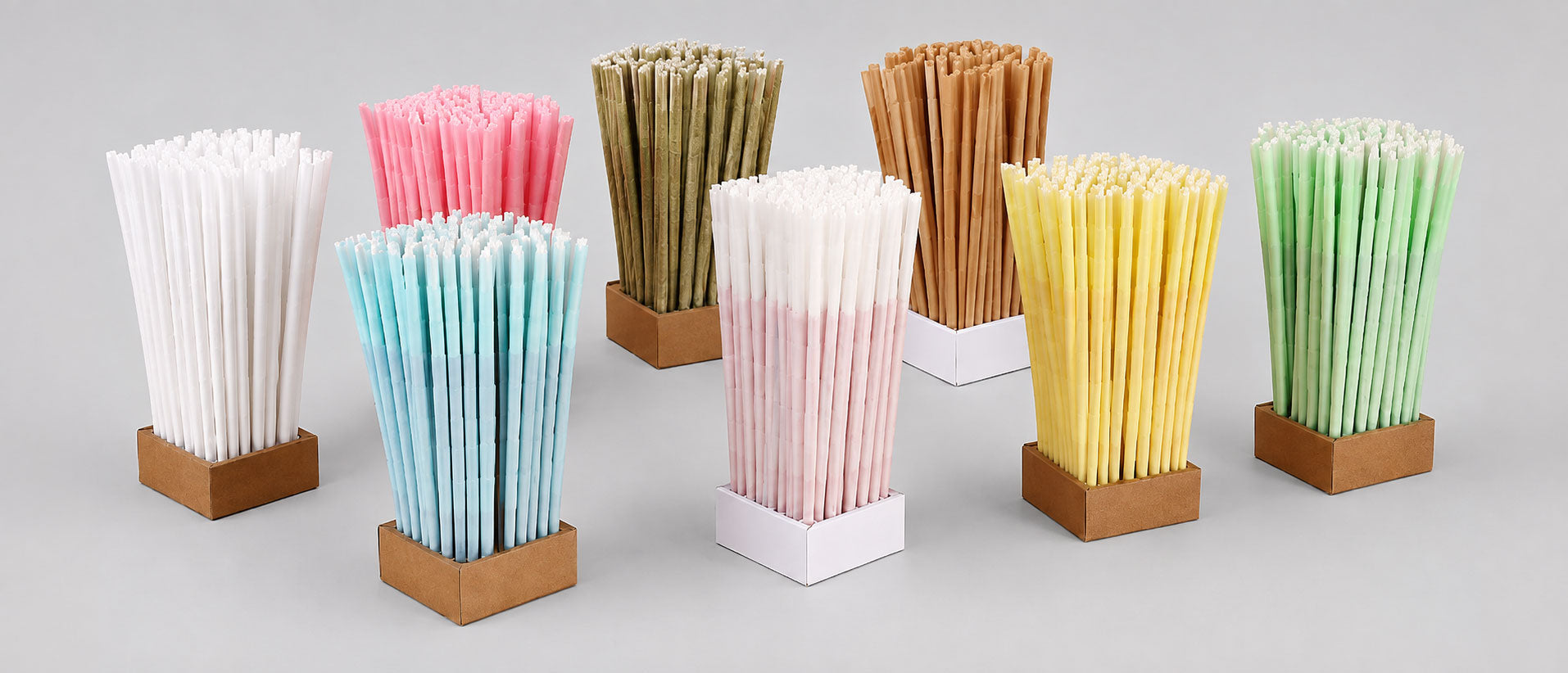 Bulk pre-rolled cones in assorted paper colors, packed for wholesale order
